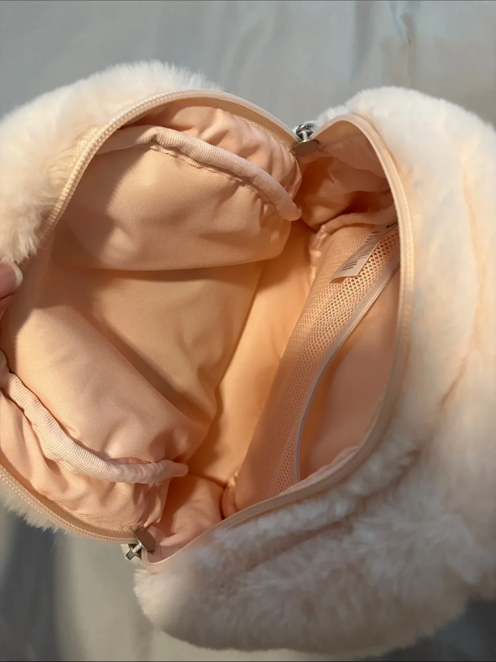 Nike Plush Faux-Fur Mini Backpack in Cream with Black Swoosh